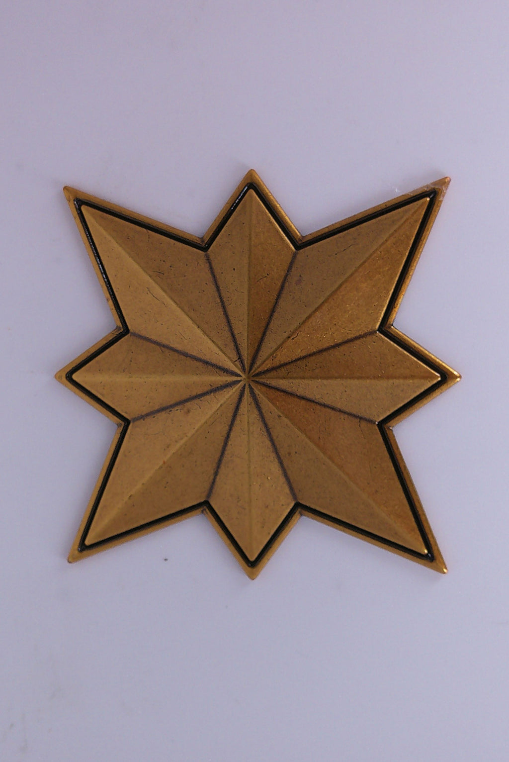 Captain Marvel metal prop emblem