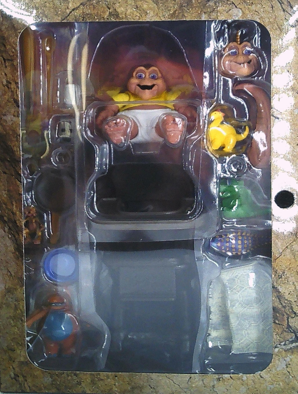 Baby Sinclair "Dinosaurs" figure 7" tall (w/chair) NECA