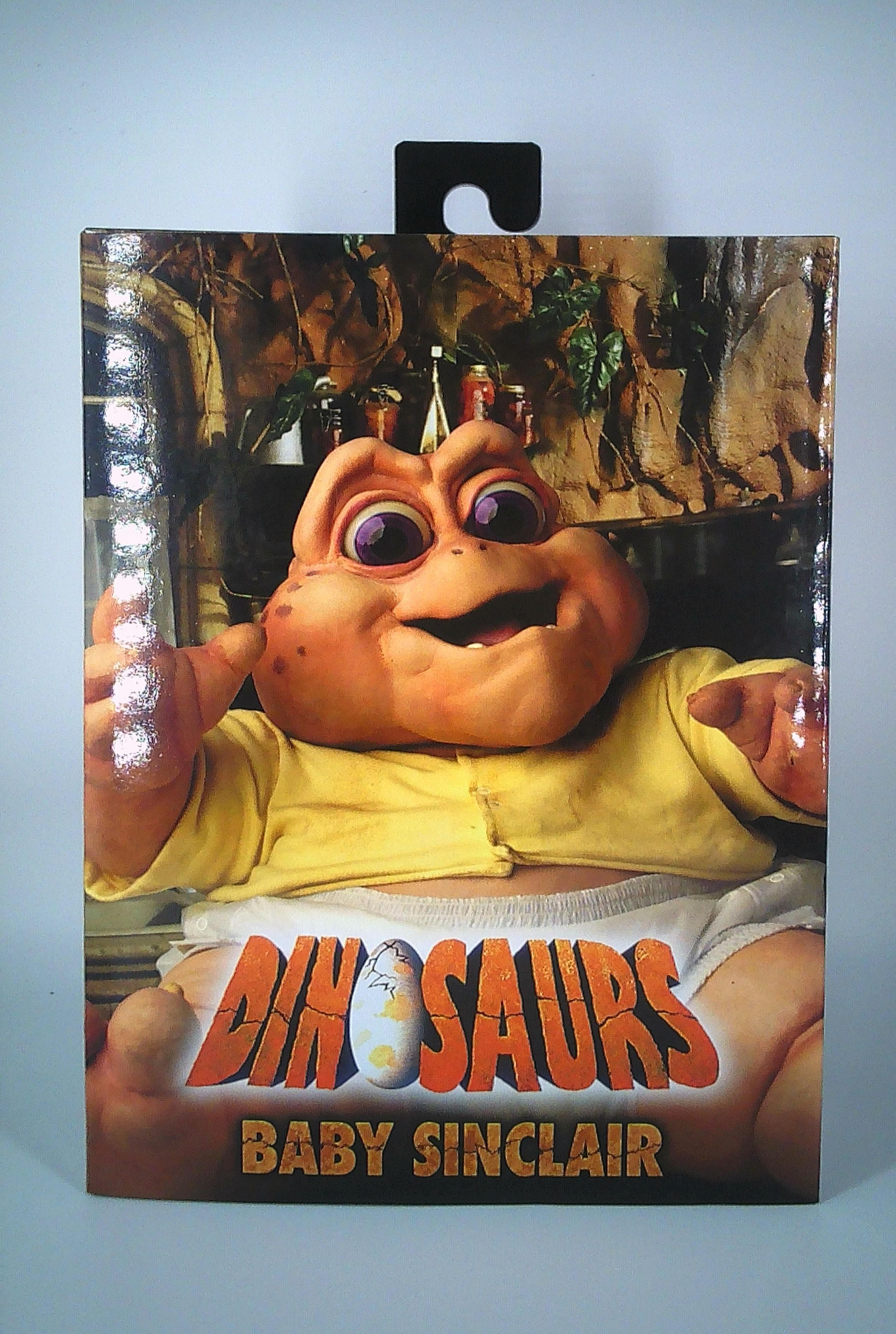 Baby Sinclair "Dinosaurs" figure 7" tall (w/chair) NECA